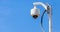 Security camera, CCTV on blue sky background