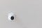 Security CCTV camera surveillance system indoor of house. A blurred night Cityscape background. Modern CCTV camera on a wall. Equi