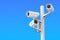 Security cctv cameras on blue sky