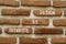 Security by design symbol. Concept words Security by design on red bricks on a beautiful brick wall background. Business finacial