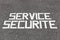 Security service written on asphalt called service securite in french