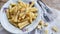 Sedani rigati pasta cacio e pepe with cherry tomatoes and parmesan cheese