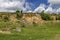 Sedimentary rock and meadow, Zavet town