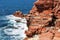 Sedimentary sea cliff, red rocks, from sicily