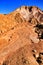 Sediments, rock formations and mineral streaks in an old abandoned quarry