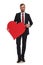 Seductive businessman holds and shows big red heart