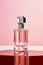 Seductive Elegance: Unveiling a Luxurious Perfume Bottle Against a Pink Chic Backdrop