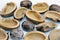 Seed coats and the seeds of rubber trees or Hevea brasiliensis on a white background