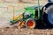 Seeder sows wheat in black soil