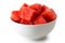 Seedless watermelon cubes in white ceramic bowl isolated on whit