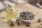 Seeds and castor oil on the wooden table