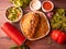 seekh kabab biryani with raita, sauce, salad and drink isolated on wooden background top view of indian and pakistani food