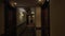 Seen long hotel corridor with glowing lights and doors from the rooms