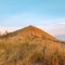 seen mountain climbers enjoying the sunrise at the top of the mountain