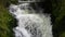 Seething picturesque clean mountain river in slow motion. The strength and beauty of a mountain stream