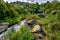 Seething river flowing among the mountain landscape.