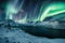 Segla peak on Senja island with Aurora Borealis, Northern Lights in winter