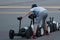 Segway rental. Happy young girl choosing segways at the box office on the street