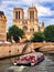 Seine Riverboat and Notre Dame Cathedral, Paris, France