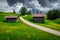 Seiser Alm resort and flowery fields with high mountains, Italy