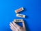 Seize the day symbol. Wooden blocks with words Seize the day. Businessman hand. Beautiful blue background. Business and Seize the