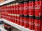 SELANGOR , MALAYSIA - 10 JULY 2020: Rows of Coca Cola cans drink on display in a grocery store.