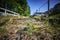 Seldom used, weathered railway line that is gradually overgrown by plants