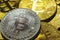 Select focus close up a Stack of silver and gold bitcoins with gold background and Business and finance concept.