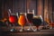 A selection of beers drinks in different glasses wooden table