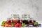 Selection of berry jams in glass jars