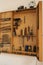 Selection of carpentry tools in cabinet