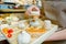 Selection cheeses on wooden board