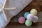 Selection of colorful bath bombs on weathered wood.