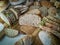 Selection of crusty sliced breads on wooden cutting board