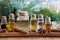 Selection of essential oils with Christmas spices and branches