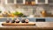 A selection of fresh fruit: fig, sitting on a chopping board against blurred kitchen background copy space