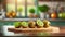 A selection of fresh fruit: kiwi fruit, sitting on a chopping board against blurred kitchen background copy space