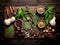 Selection of fresh spices and herbs on dark wooden table - top view