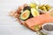 Selection of healthy unsaturated fats, omega 3 - fish, avocado, olives, nuts and seeds.