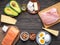 Selection of Ketogenic diet products on wooden background with copyspace in the center