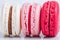 Selection of macaroons in different colors on bright white background