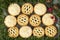 Selection of mince pies on a platter decorated for christmas
