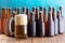 Selection of multiple unlabelled bottles of beer