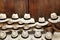 A selection of Panama hats piled up against a wooden door, Cartagena, Colombia