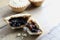 Selection of several mince pies, some broken open or partly eaten. A traditional festive Christmas dessert or pudding.