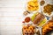 Selection of traditional hanukkah food for festive dinner, wood background