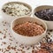 Selection of variety of gourmet rice in bowls. Selective focus