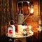 Selection of vintage lamps and a tractor front