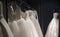 Selection of white wedding dresses or ball gowns