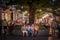 Selective blur on old senior women having a break on a bench discussing during a summer evening on Kneza Mihailova